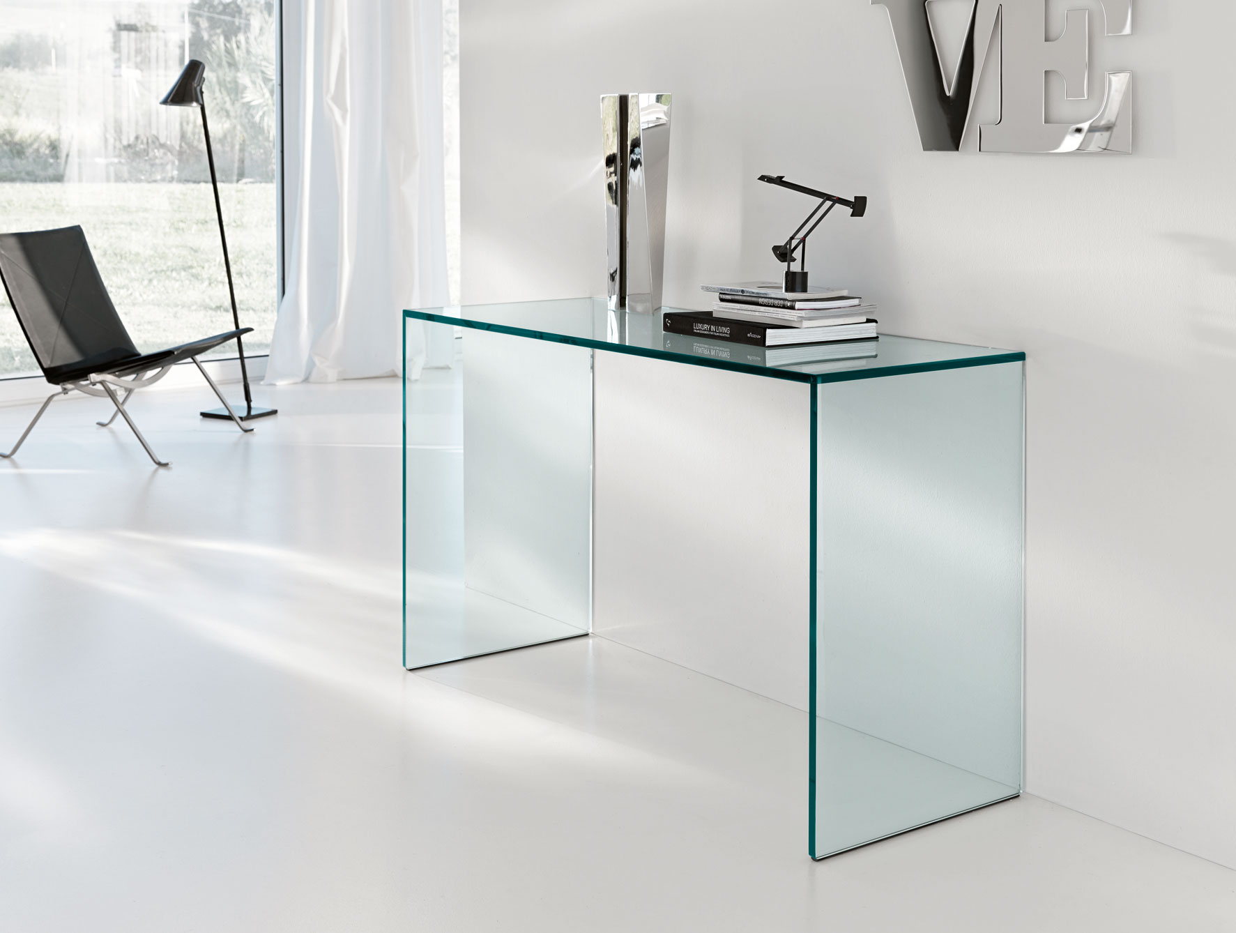 Gulliver modern italian designer glass console handmade and shown in transparent glass. from nellavetrina.com