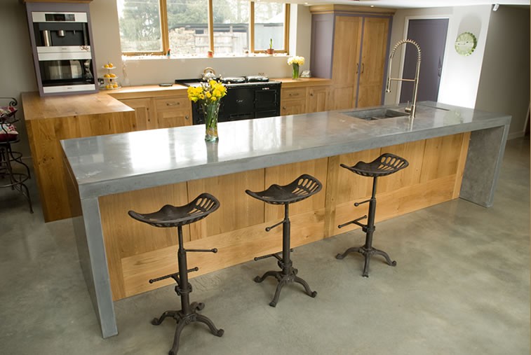 wooden kitchen with concrete worktop from lovewoodfurniture.co.uk