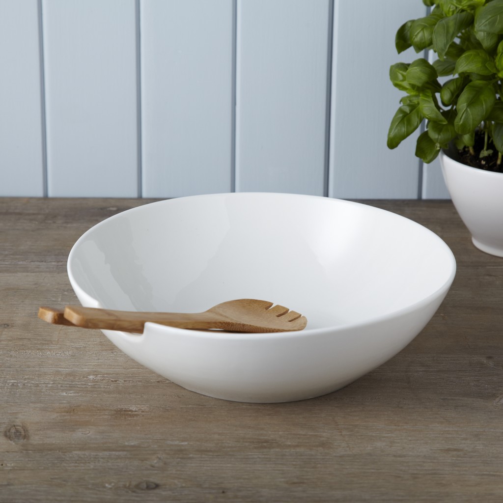 white bowl with wooden servers