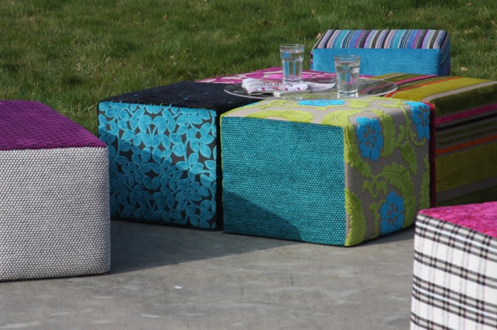 square cushions that double up as extra seating or tables