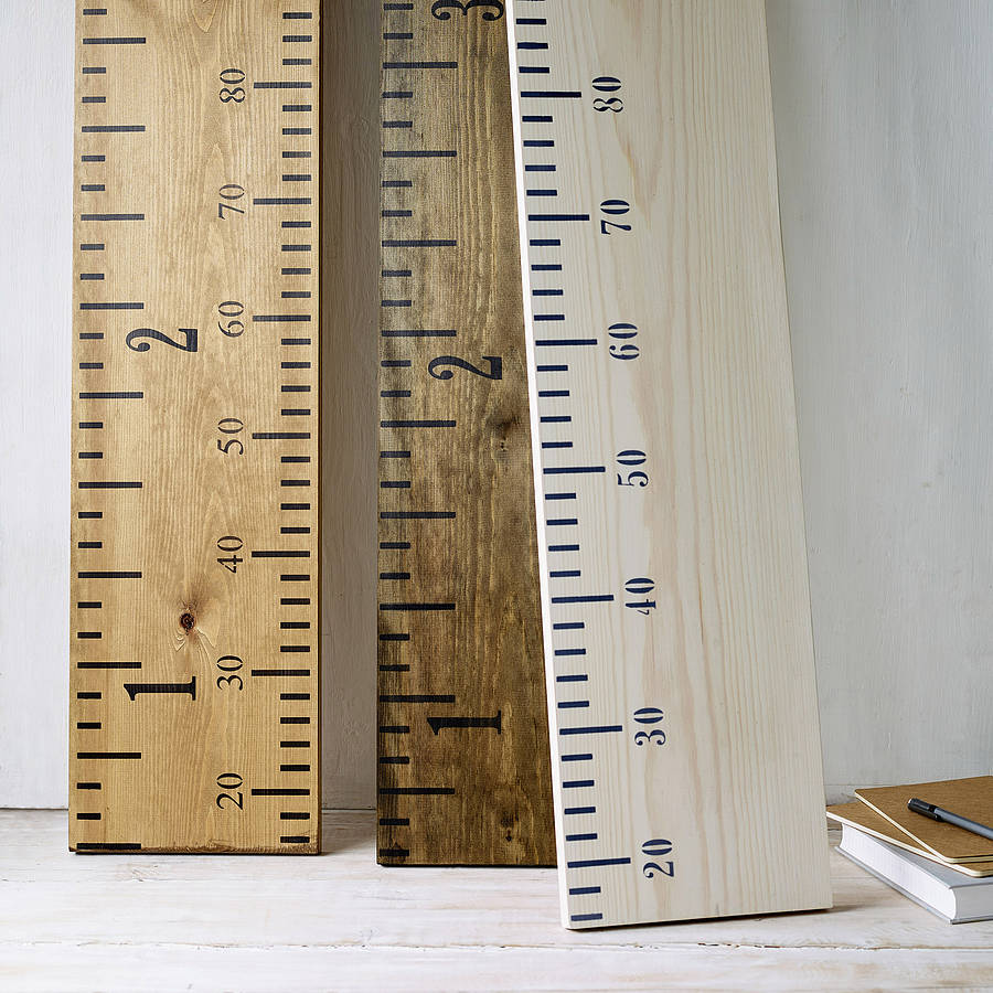 wooden ruler height chart in aged oak
