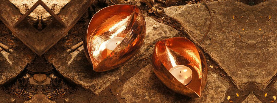 copper tea light holders from maud interiors