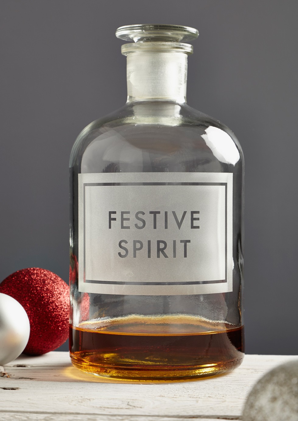 festive spirit etched apothecary bottle from limelace.co.uk