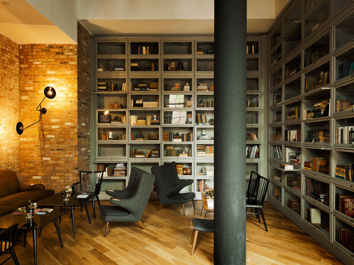 library shelves at the wythe hotel by workstead