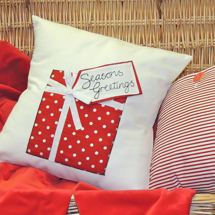 original_christmas-spotty-parcel-cushion by designer j at not on the high street