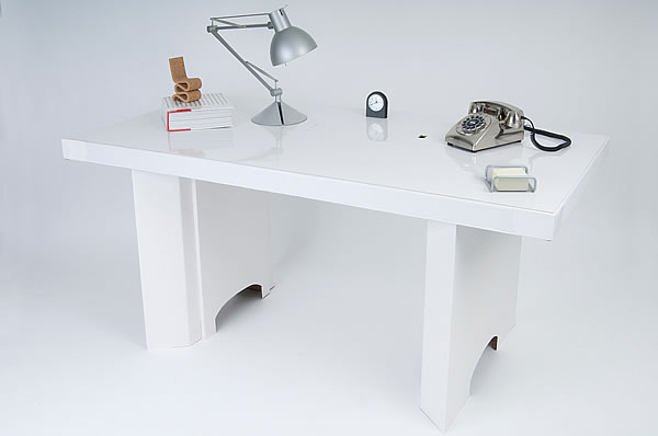 white cardboard desk paperweight