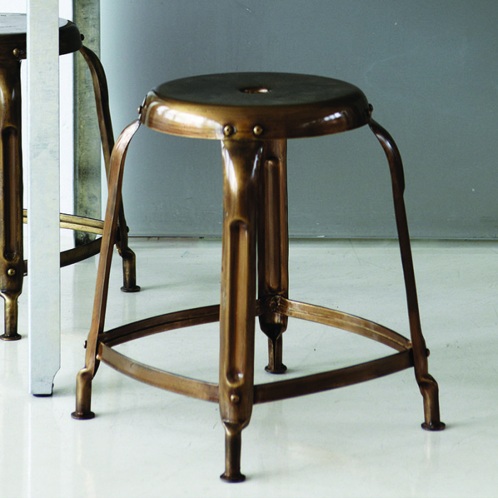 close up: copper industrial style stool
