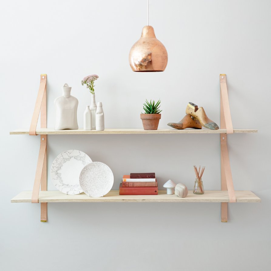 wooden shelves with leather brackets by lightly.com.au