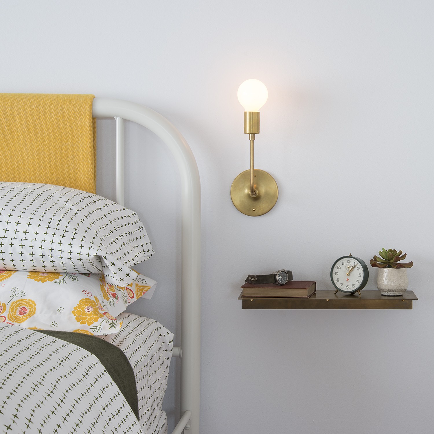 brass wall light and shelf from schoolhouse electric