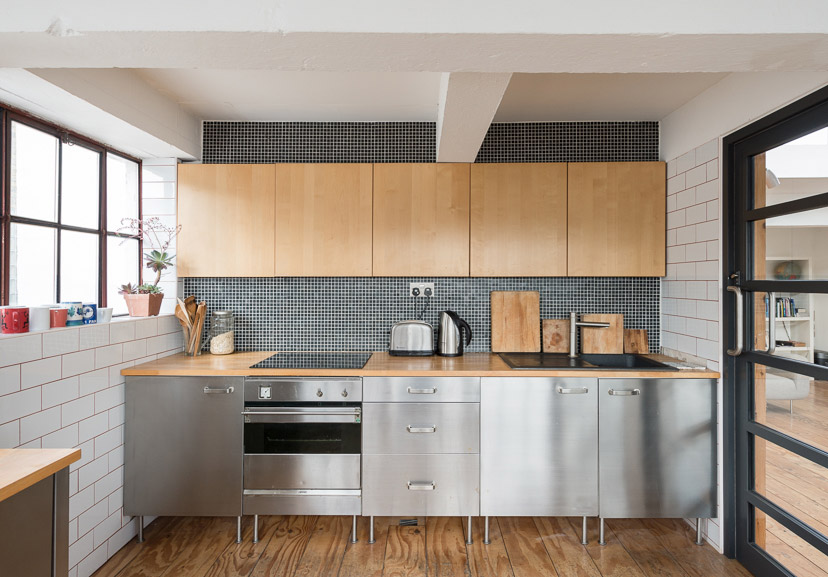 stainless steel kitchen, wooden cupboards