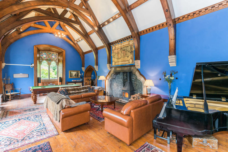blue walls and vaulted ceiling