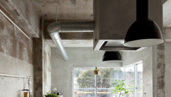 concrete house by Airhouse Design with vintage lighting from skinflintdesign.com