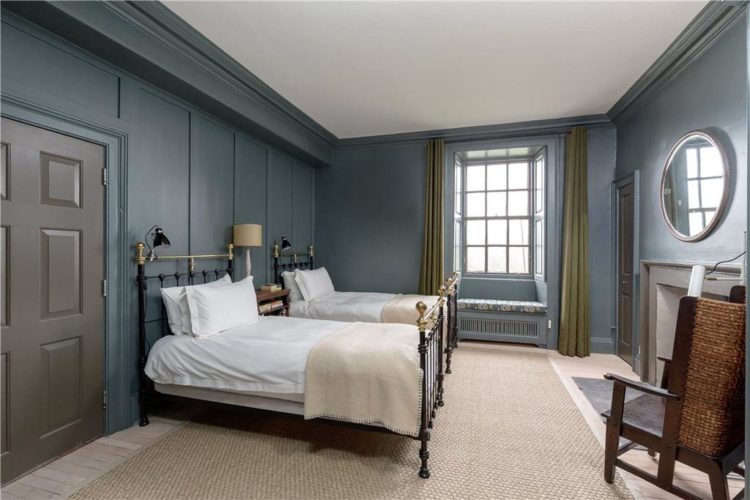 grey bedroom with panelling