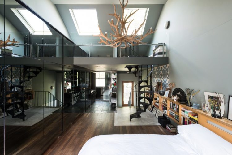 grey-bedroom-with-spiral-staircase-and-mezzanine