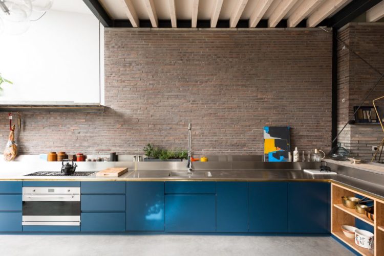 blue-kitchen-and-exposed-brick-wall