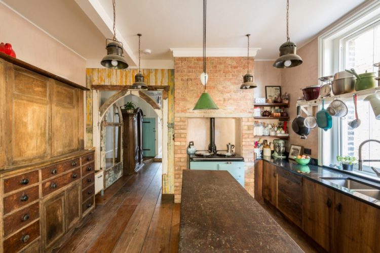 rustic-wooden-kitchen-with-industrial-lighting-via-the-modern-house