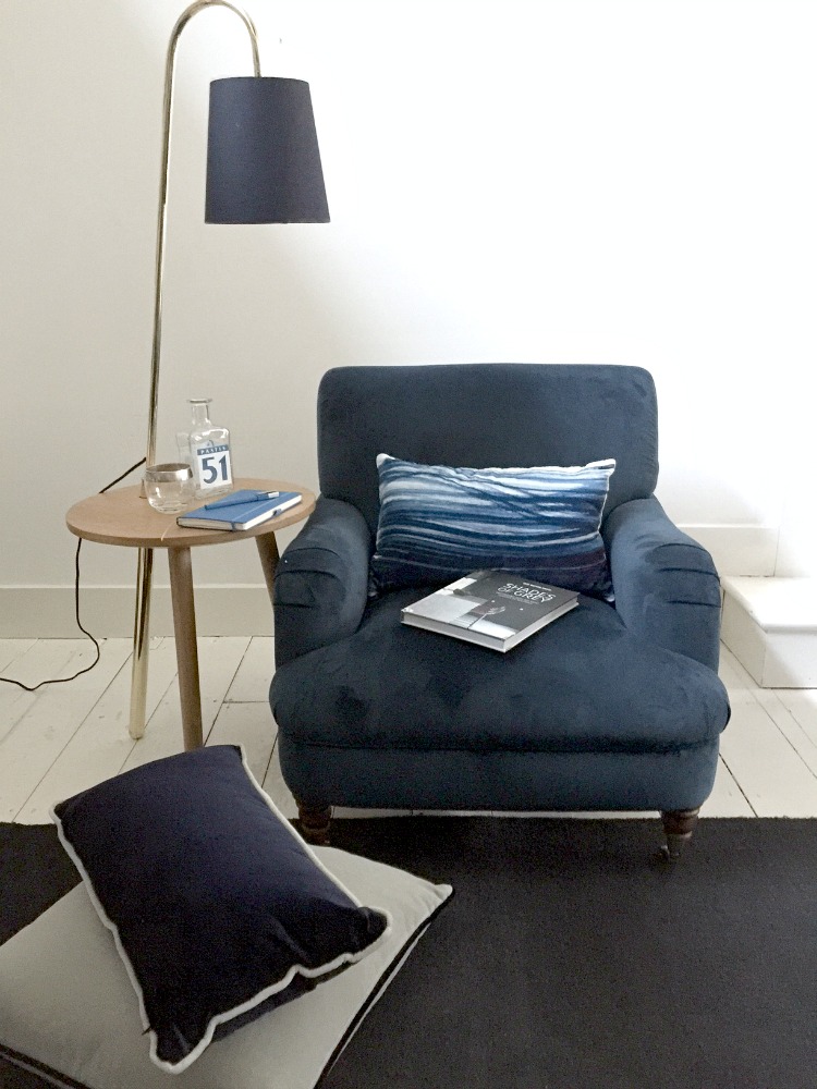table-light-and-navy-blue-armchair
