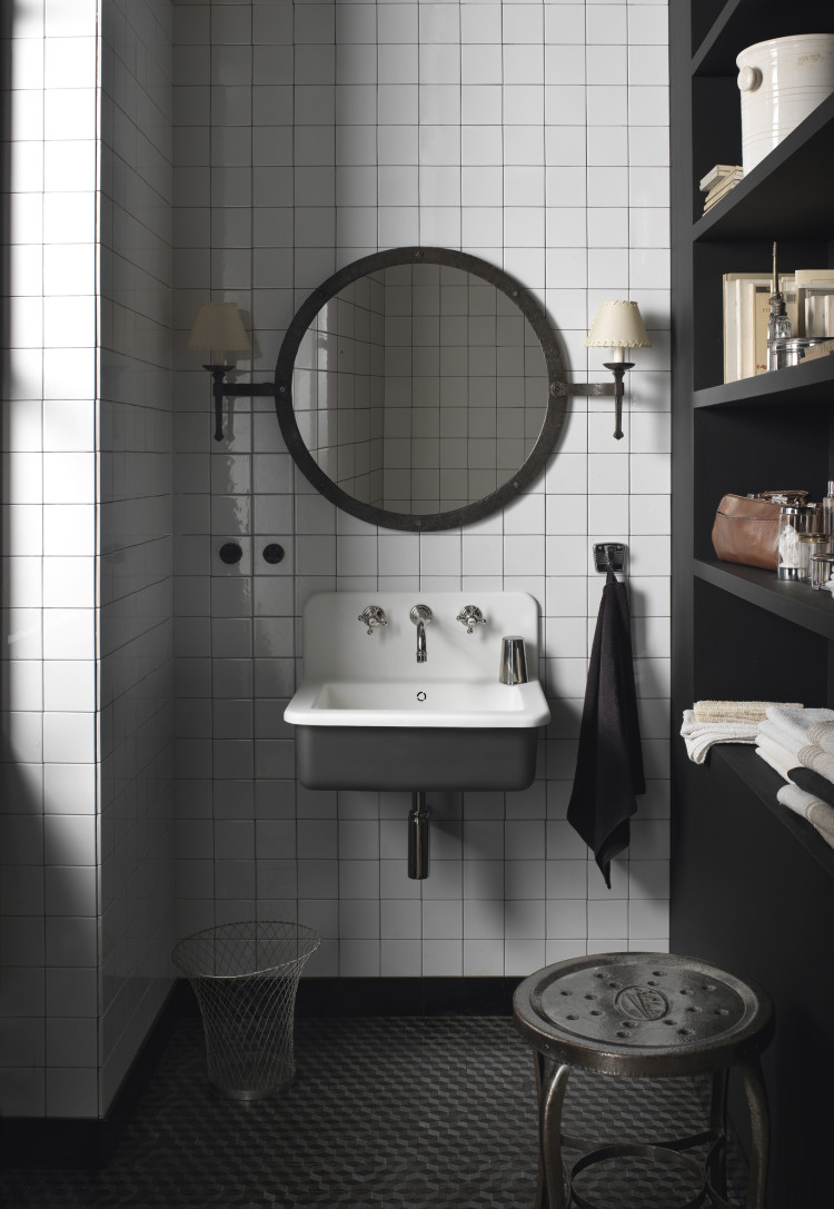 dupont corian basin with black shelves and square tiles