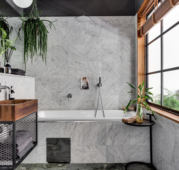 marble bathroom via real estate agency Alexander White Styling by Stylingbolaget | Photo by Henrik Nero