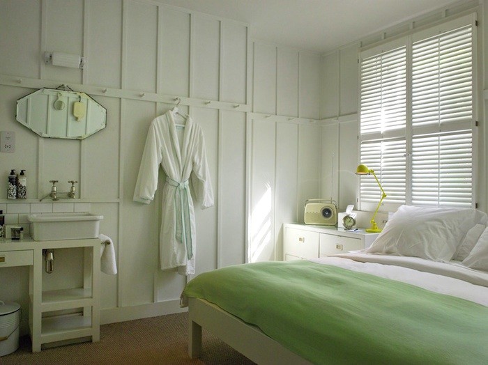 shaker peg storage by ilse crawford at high road house image via remodelista