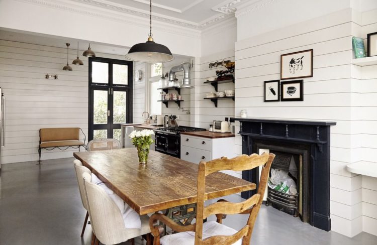 black and white kitchen with rustic wooden table via shootfactory