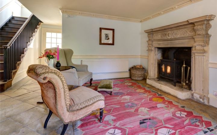 open fire and large rug via savills