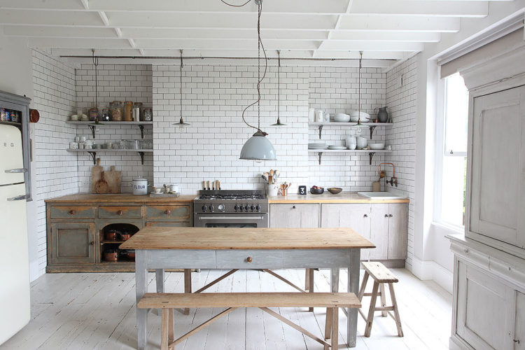 white kitchen with subway tiles via lightlocations.com