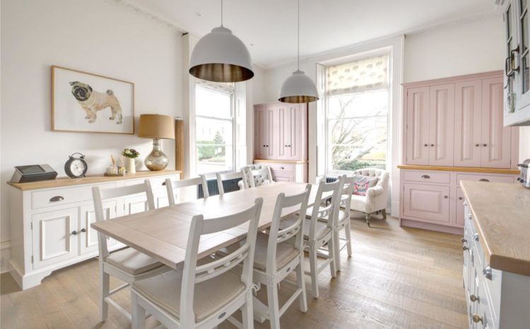 dining room with pink cupboards