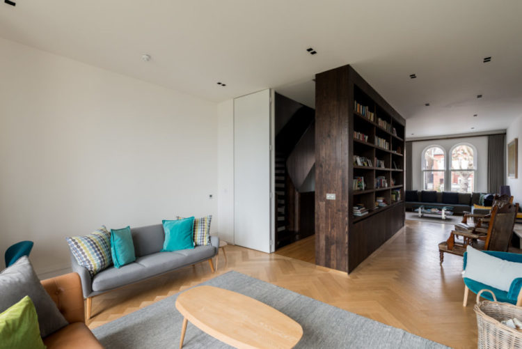 shelves as room divider via the modern house