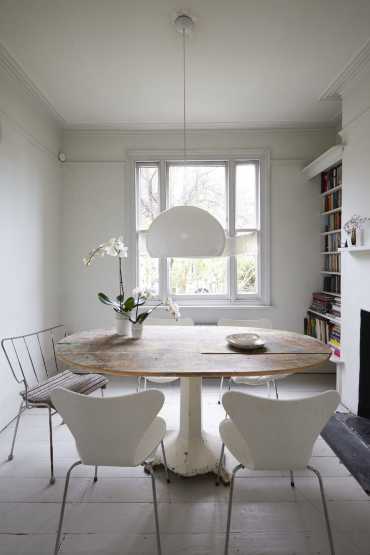 rustic round dining table in jasmine house via shootfactory
