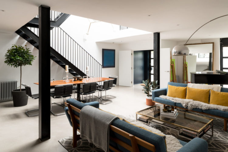 zoning an open plan space via the modern house