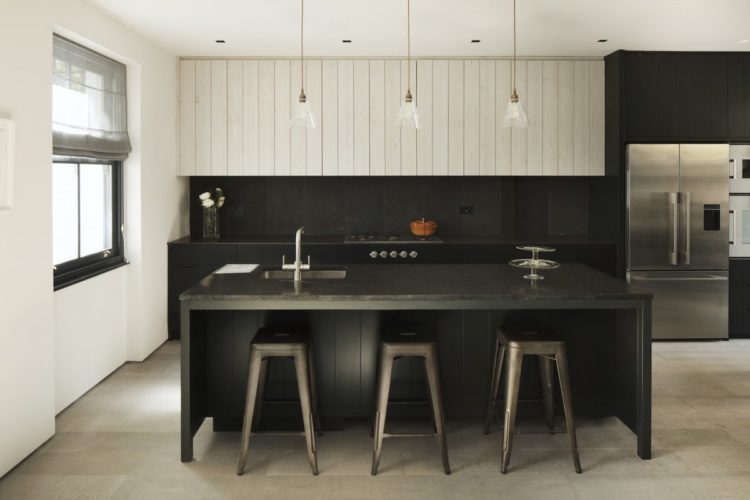 black kitchen with shiplap board walls white via shoot factory