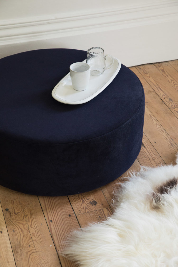 navy blue velvet round ottoman from rose and grey