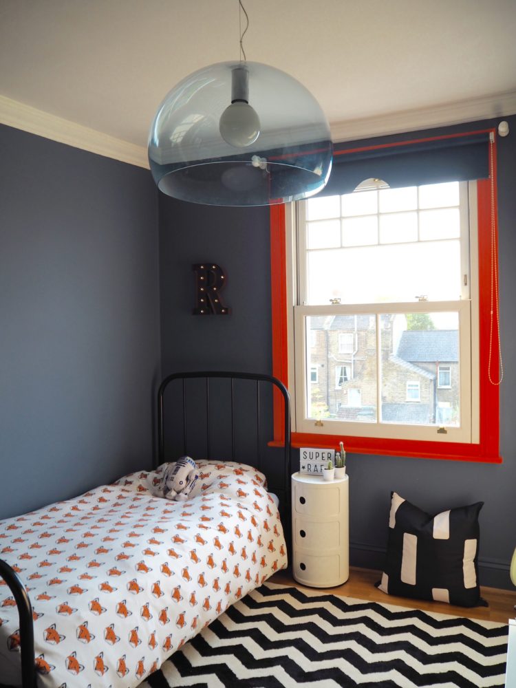 grey walls and orange window frame by jess hurrell of gold is a neutral
