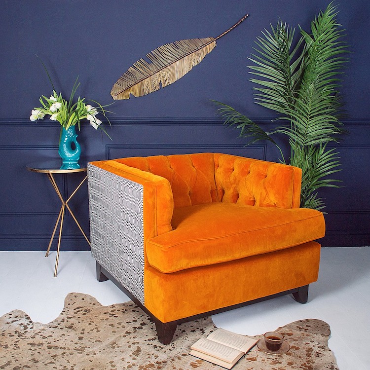 orange buttonback armchair