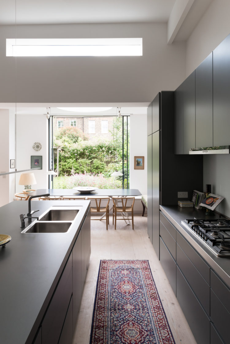 architect your home made the most of this narrow extension by creating a gorgeous dining are with a huge picture window