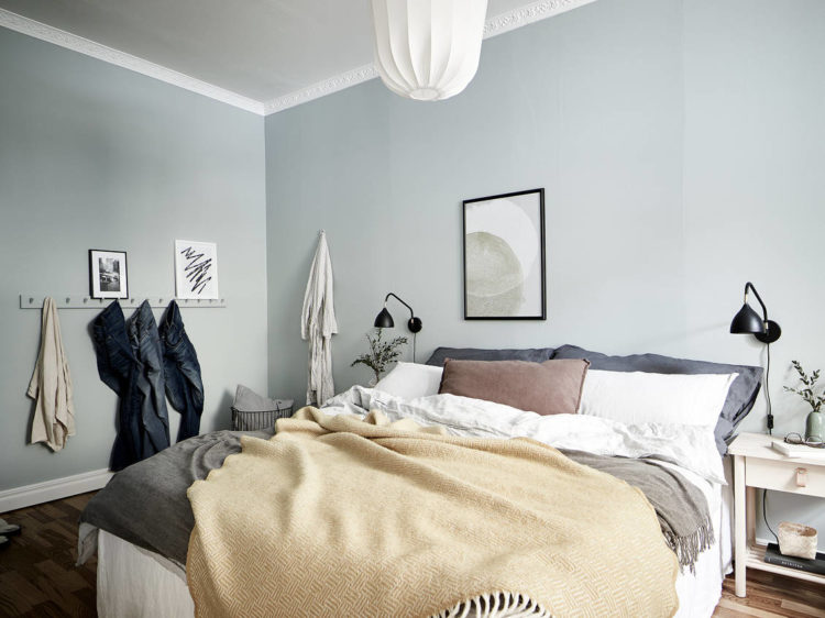 pale grey bedroom with shaker peg storage
