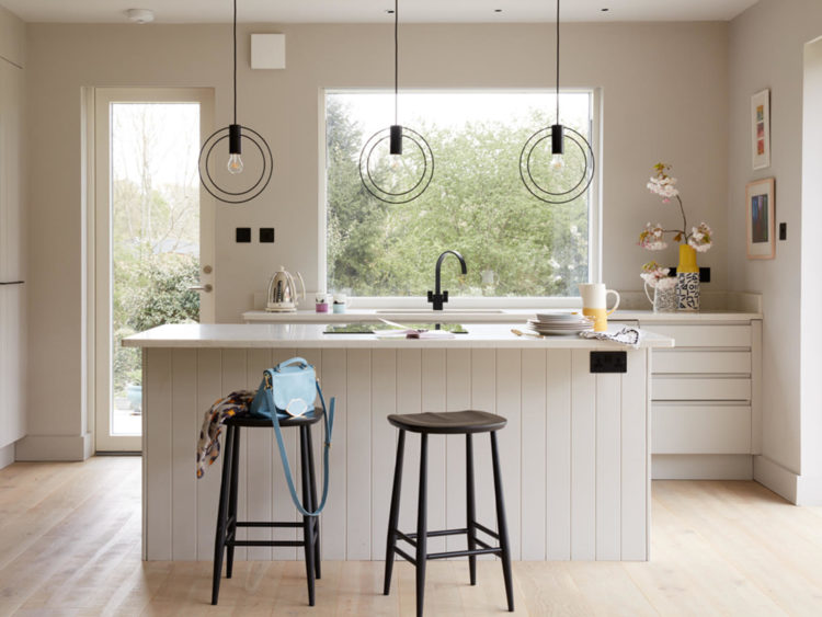 open plan island with wall mounted extractor fan via sophie robinson
