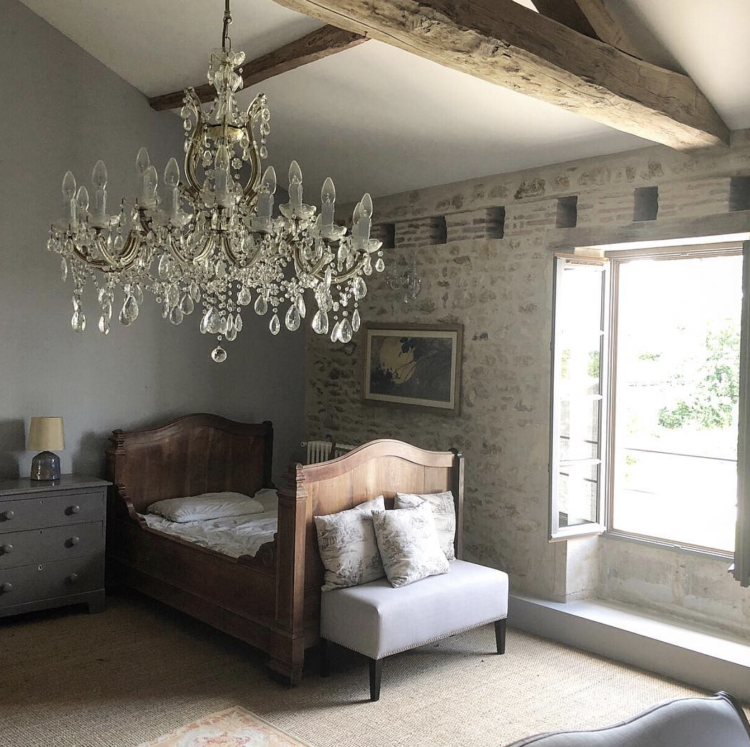 rustic bedroom in luxury boutique holiday home in the Vendee