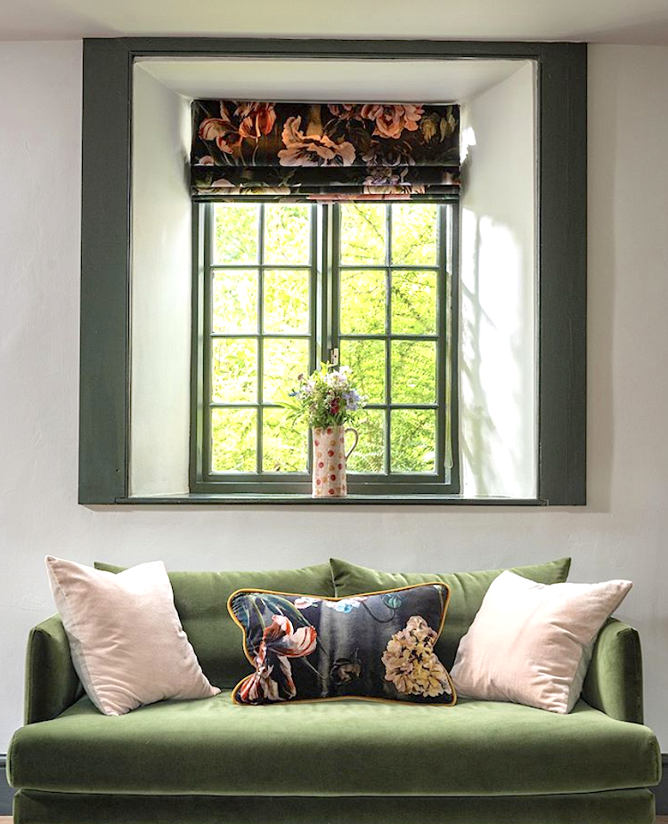 green sofa and window by @siobhanhaylesinteriors