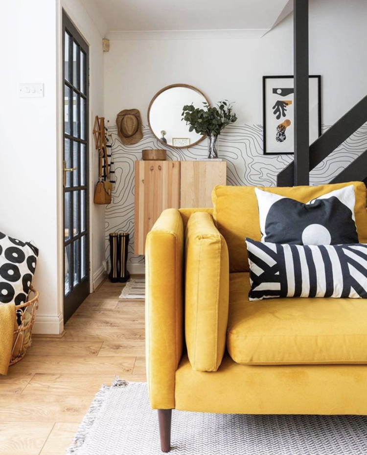 yellow sofa, black and white, medina grillo, rented home