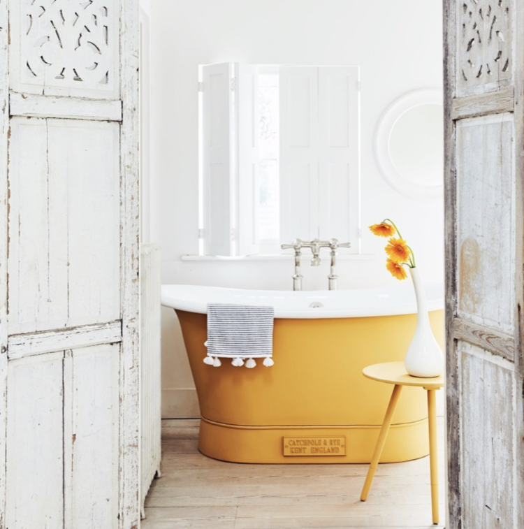 A look at the new season with some Monday inspiration from Kate Watson-Smyth. Brighten up a space with a bold splash of yellow, the classic roll-top bath has been given a modern update. #yellowbath #bathroom #madaboutthehouse