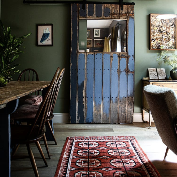green walls and vintage rug by wattleanddaubhome