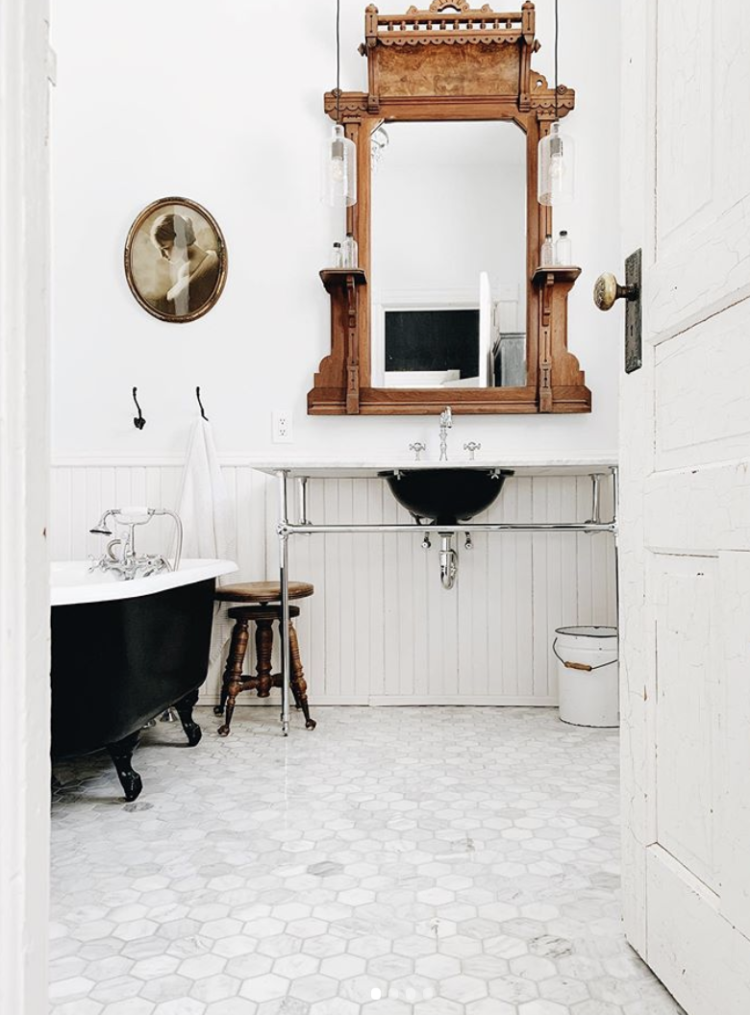 black and white bathroom with vintage wood via the victorian farmhouse