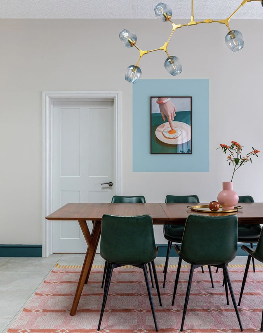 Kate Watson-Smyth looks at ways of introducing pops of colours to a scheme. A favourite piece of artwork is made a focal point with a wide painted border in this dining room. #popofcolour #diningroom #madaboutthehouse