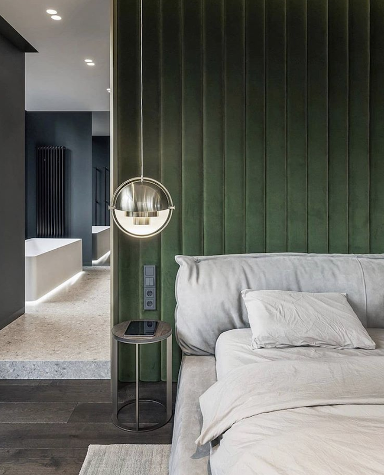 Kate Watson-Smyth looks at how green, in all its, shades has become a popular choice for interior schemes. It is known to be calming and inspire creativity it works especially well in the bedroom like this geen velvet wall which acts an oversized headboard. #gubi #madaboutthehouse #greenvelvet