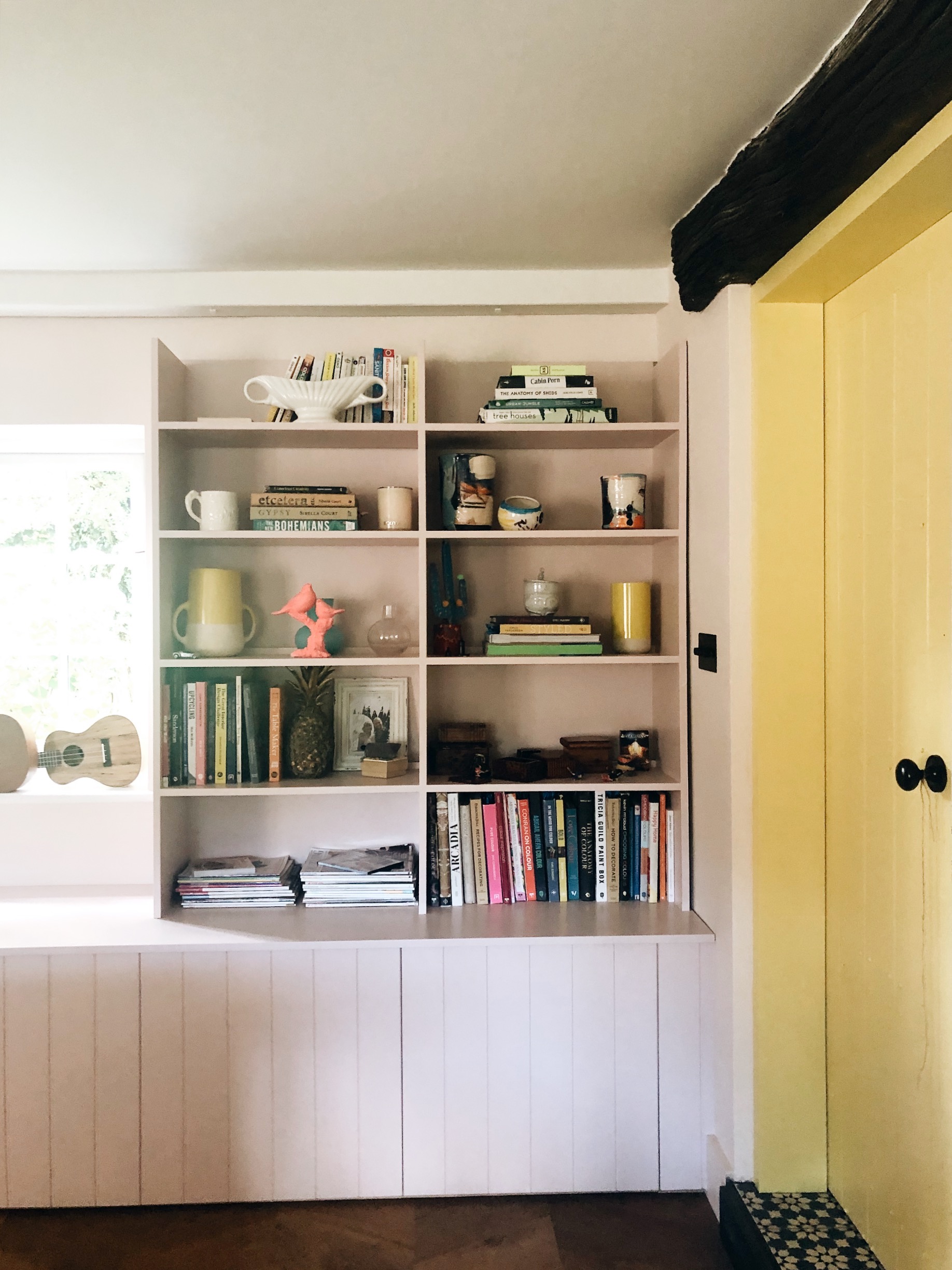 yellow door and tongue and groove panelling at the home of sophie robinson