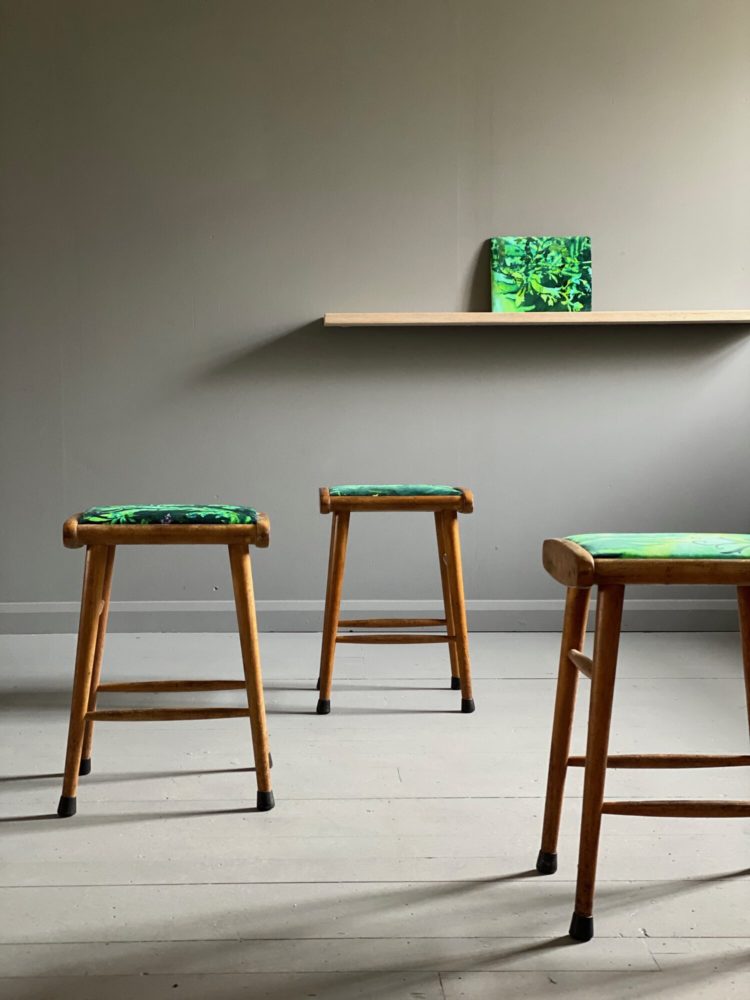 Vintage wooden stools with modern green upholstered seat by Jay Blades