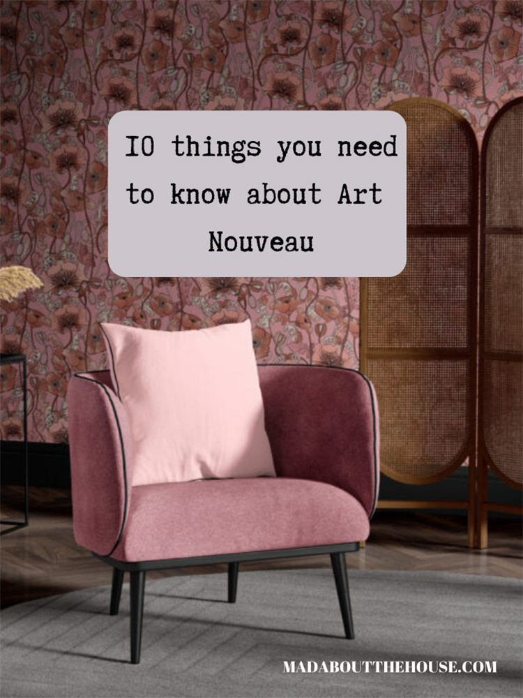 Art Nouveau style pink velvet armchair pink floral wallpaper and curved cane room divider