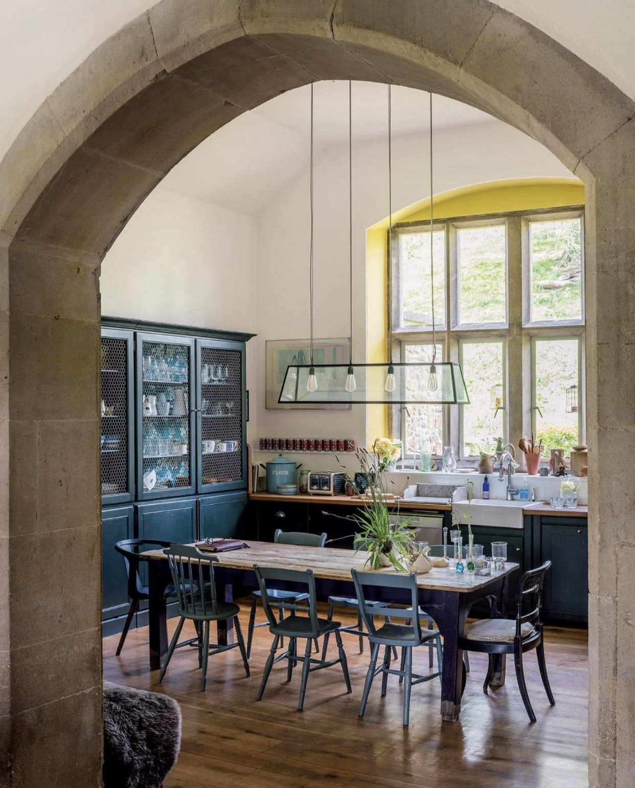 yellow window frame at the home of Joa Studholme for house and garden photo by andreas von einsiedel
